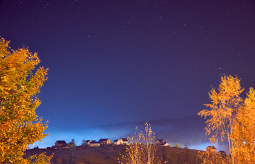 Beautiful landscape. Night sky with stars in the Carpathian mountains.