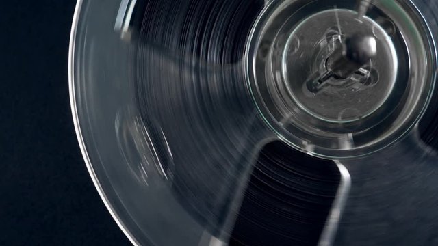 Close up of a rotating reel with tape