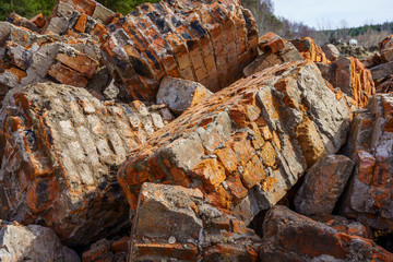 bunch of broken red bricks and other debris