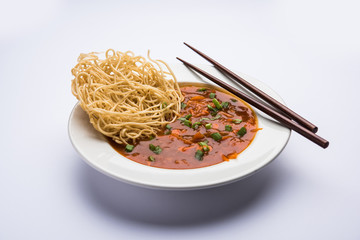 American chop suey/ chopsuey is a popular indochinese food. served in a bowl with chop sticks. selective focus