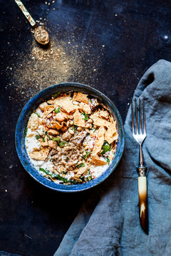 Chicken Fatteh, Lebanese chicken salad with chickpeas, yogurt, fried flat bread and zaatar