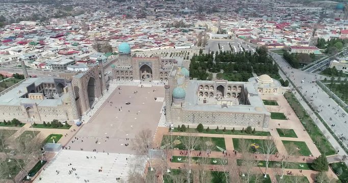 Aerial cityscape The Registan Square is the best place to discover the old Uzbek architecture and to enjoy the great mosaic decorations, Samarkand, Uzbekistan.