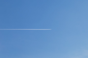 trail from the plane in the sky