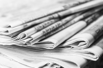 News concept, folded newspaper closeup.