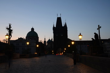 Fototapeta na wymiar Old town side of the Charles Bridge in Prague at sunrise