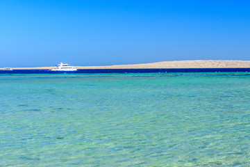 Fototapeta na wymiar White yacht in Red sea not far from the Hurghada city, Egypt