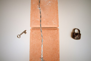 Either side of the wall