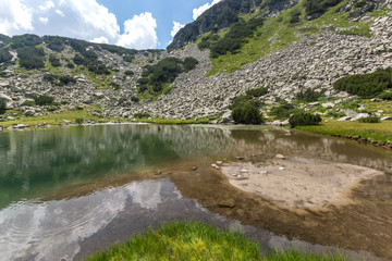 Fototapeta na wymiar Amazing Summer landscape of Muratovo (Hvoynato) lake at Pirin Mountain, Bulgaria