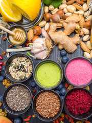 Various colorful superfood powders, cleasing and detox concept