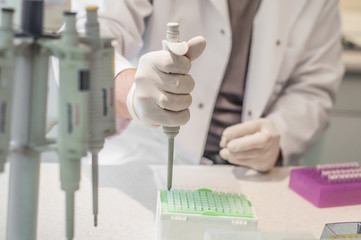 Close-up working in laboratory