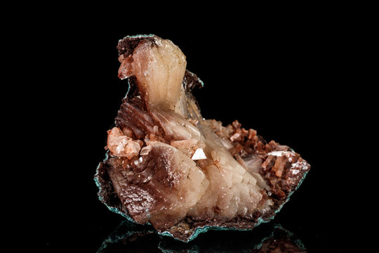 Macro of a stone Albite mineral on a black background