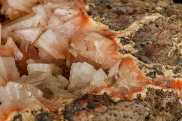 Macro of a stone Stilbite mineral on a black background
