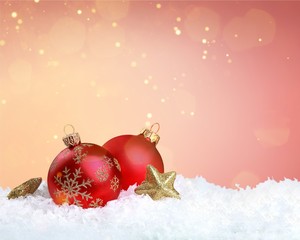 Red shiny decorative Christmas balls on white background