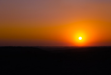orange sunset on the horizon