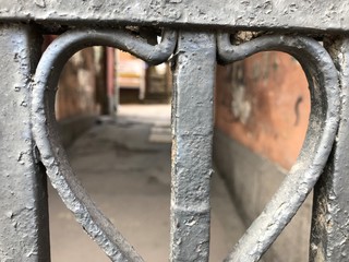 narrow street through the fence