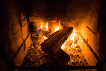 Photo of burning fire in fireplace for graphic and web design, for website or mobile app.