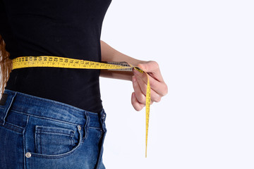 Woman taking measures on ther body.