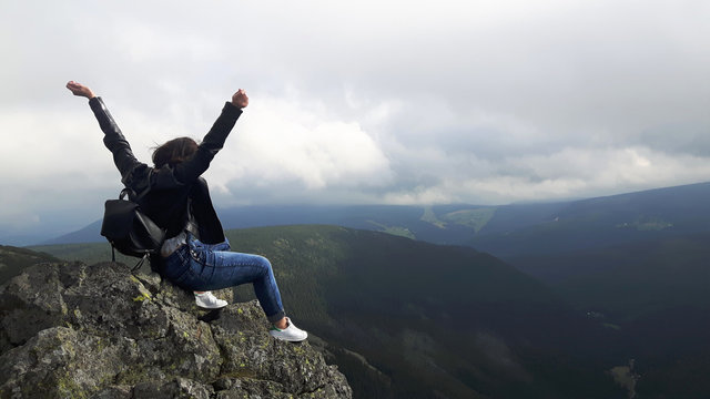 Conquering the top. Top of the mountain