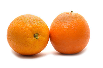Fresh Yellow Oranges isolated on white background.