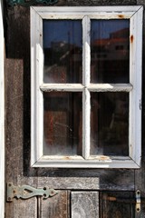 Old and colorful wooden door with iron details