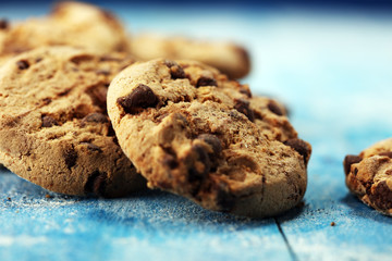 Chocolate cookies on wooden table. Chocolate chip cookies