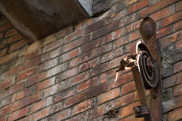 Background Of Old Vintage Dirty Brick Wall With Texture. Shabby Building Facade With Damaged Plaster