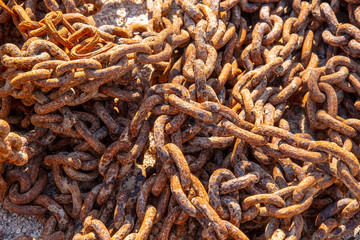 detail photo of an old rusty chain on a boat