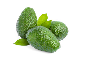 Ripe avocados with leaves isolated on white background. Healthy food