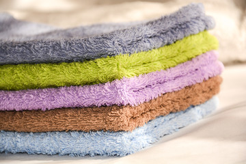 terry colorful towels in a stack
