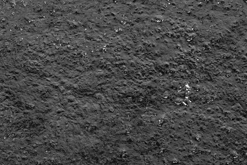 Wall fragment with scratches and cracks