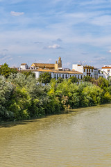 Fototapeta premium Picturesque Embankment of the Guadalquivir River in Cordoba. Cordoba, Andalusia, Spain.