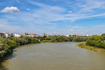 Obraz premium Picturesque Embankment of the Guadalquivir River in Cordoba. Cordoba, Andalusia, Spain.