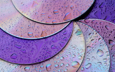 abstract circles background. CDs SD multicolor water drops background