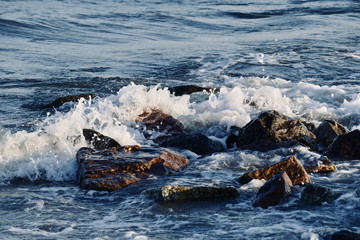 waves breaking on the rocks