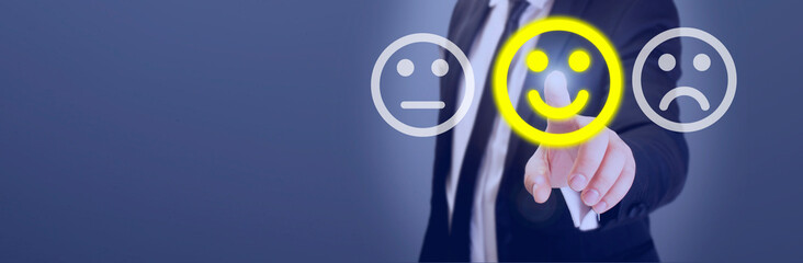 man touching smiley in customer satisfaction survey