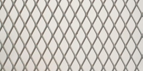 rhombus pattern metal grill background
