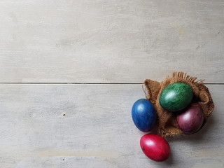 Easter eggs on a white wooden table