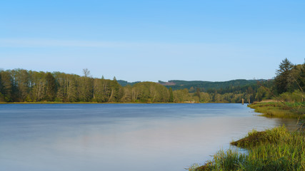 Afternoon Smooth River Scene in Wilderness
