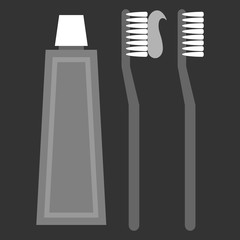 Toothpaste and Toothbrushes - Tube of toothpaste, toothbrush with toothpaste swirl, and plain toothbrush