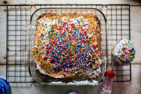 Colorful cake decorated with plenty of sprinkles