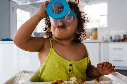 Hungry Child Eating Snack