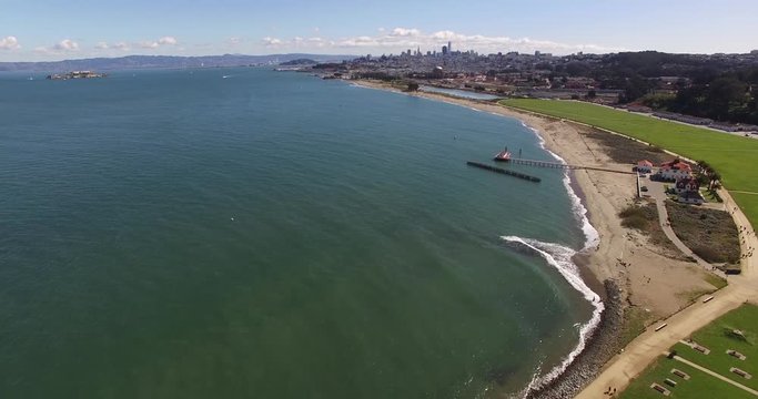 Dolly shot of Downtown San Francisco, California. Drone aerial TILT UP view of DTSF and Alcatraz Island. Bay area by Airflow Creations. 