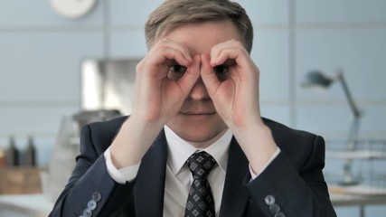 Businessman Searching New Opportunities with Binocular