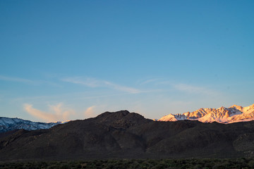sunrise sky over mountain range Sierra Nevadas California