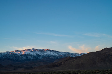 Obraz na płótnie Canvas sunrise sky over mountain range Sierra Nevadas California