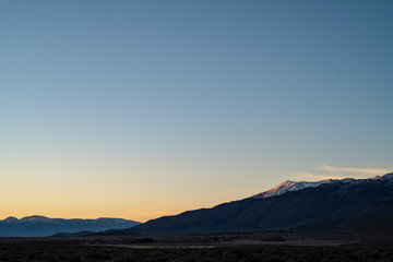 sunrise sky over mountain range Sierra Nevadas California