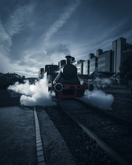Old dead train car at the railway station of Gijon