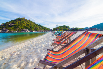 Fototapeta na wymiar Colorful beach chair summer vacation on white sand beach