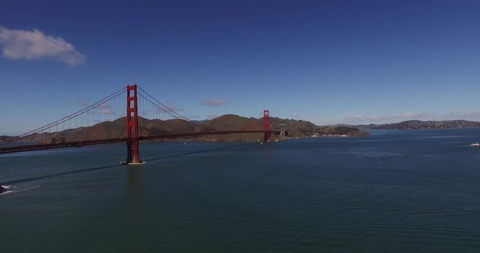 Aerial of Golden Gate Bridge in San Francisco. Dolly forward by drone on clear day.