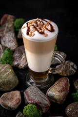 Mocha white coffee with milk, chocolate, syrup, slices, liqueur, pine nuts. Coffee card. Espresso based drinks.